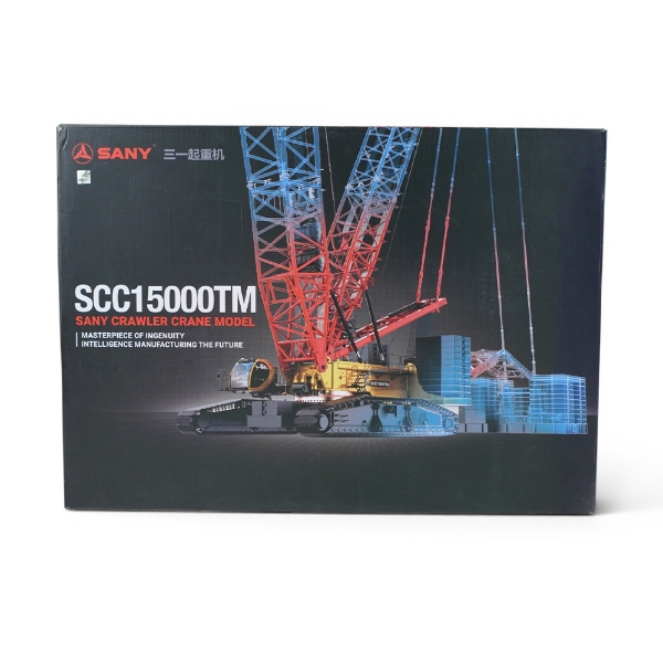 Front of SANY SCC15000TM crawler crane model box showing large red lattice boom crane lifting structure with branding and product name