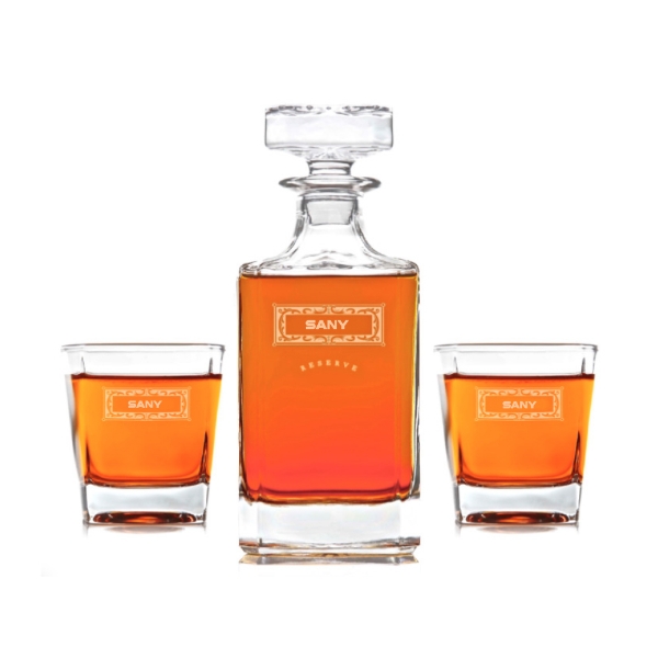 Glass SANY decanter with matching etched rocks glasses displayed as a three-piece gift set.